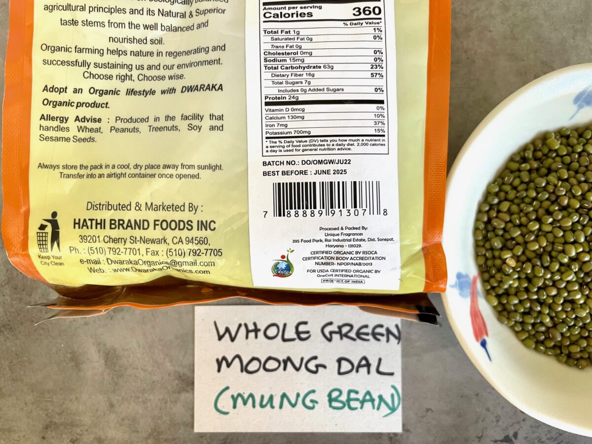 Whole green moong dal in package and display bowl.
